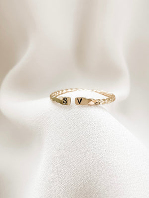 Open twisted initial ring gold