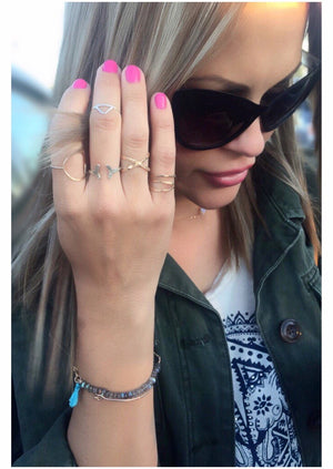 Model with stacking rings gold