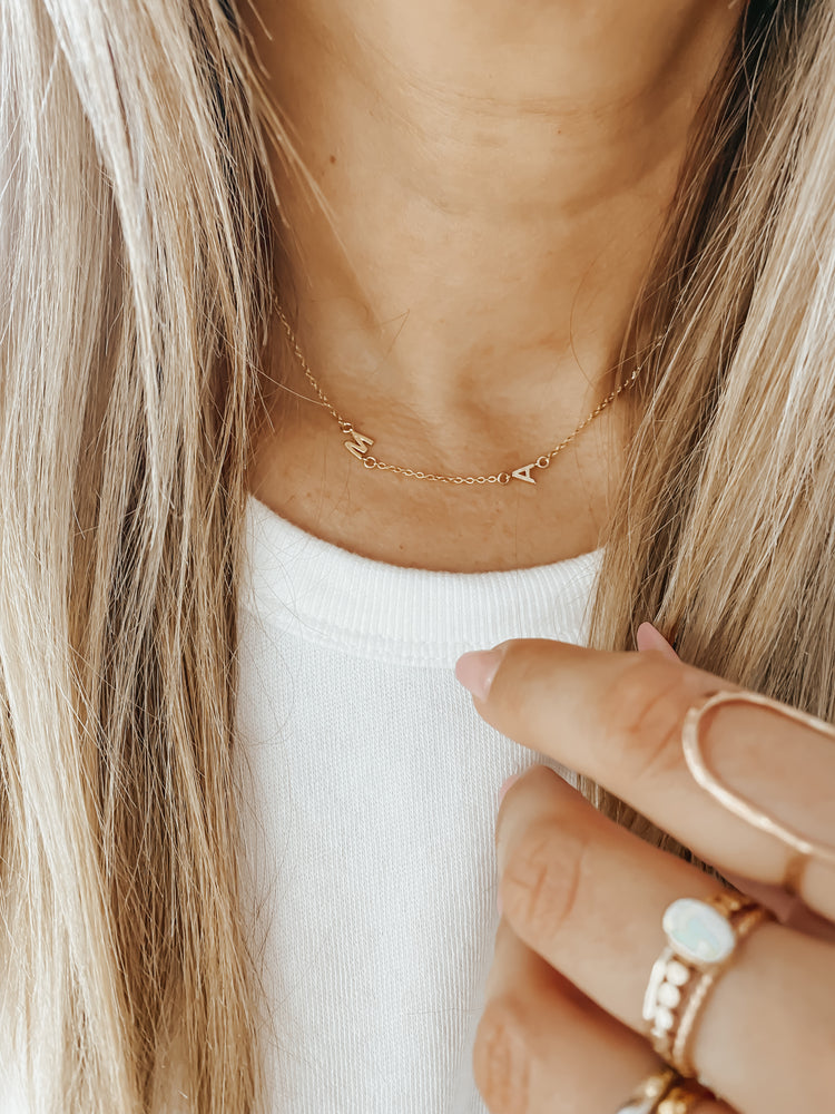 Gold Sideways Medium Initial Necklace – Four Sisters Boutique