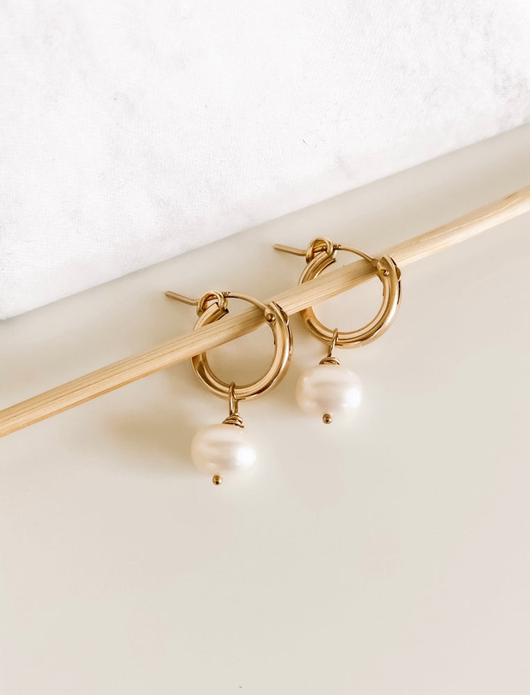 pearl huggie earrings gold