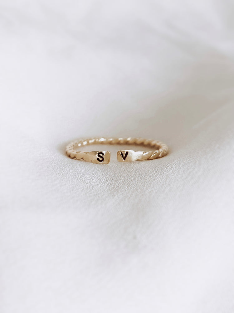 open twisted initial ring gold